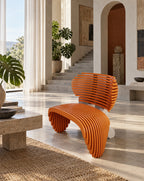 Parametric Zebra Lounge Chair, a sculptural CNC-cut slat lounge chair in a sunlit living room, made to order in Mississauga
